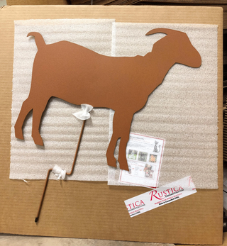 Arte de pared o de patio con cabras de metal